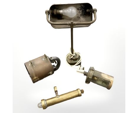 A banker's-style desk lamp, height 38cm, a copper electric torch, ship's bulkhead light and a further brass-cased light. (4)
