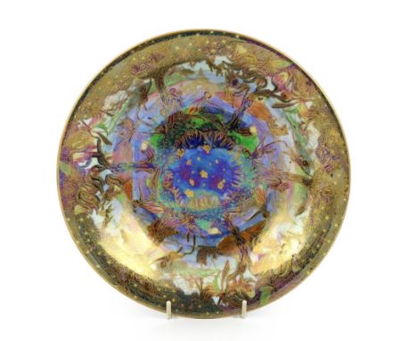 A Wedgwood Fairyland lustre ‘Jumping Faun’ Lily tray, designed by Daisy Makeig Jones, c.1925, the interior decorated in the d