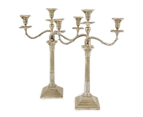 A pair of Edwardian silver two branch, three light Corinthian column candelabra, by William Hutton &amp; Sons, with acanthus 