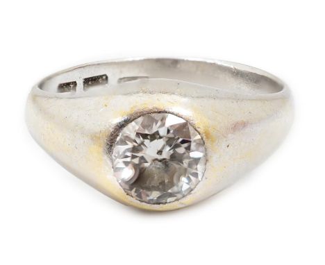 An 18ct white gold and gypsy set solitaire diamond ring, the stone weighing approximately 1.35ct, with an approximate estimat