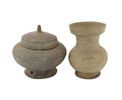 Two Chinese stoneware vessels, Han dynasty (202BC - 220 AD), one jar with domed cover and turned finial, on a pierced foot, 1