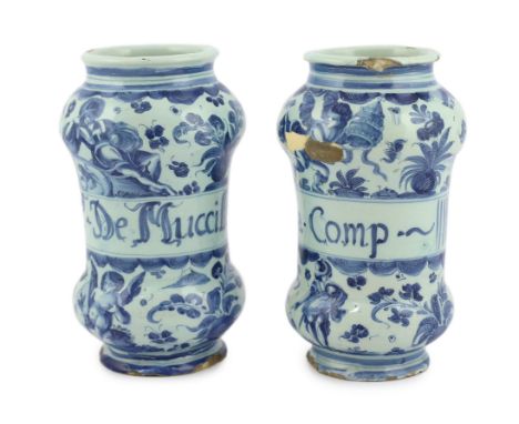 A pair of Italian blue and white maiolica albarellos, Savona, late 17th century, the first painted with the title ‘De Muccill