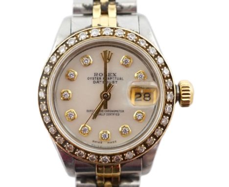 A lady's 1980's stainless steel and gold Rolex Oyster Perpetual Datejust wrist watch, with mother of pearl dial and diamond d
