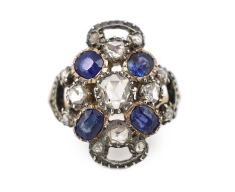 An antique gold and silver, sapphire and rose cut diamond cluster set dress ring, size K, gross weight 5.5 grams.***CONDITION