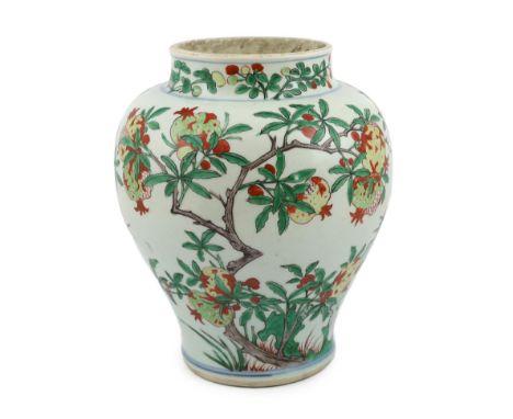 A Chinese wucai ‘pomegranate’ baluster vase, Transitional, Shunzhi period, c.1650, painted with pomegranate and fruiting bran