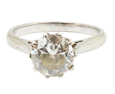 A white gold and solitaire diamond set ring, the stone weighing approximately 1.30ct, with an estimated colour and clarity of