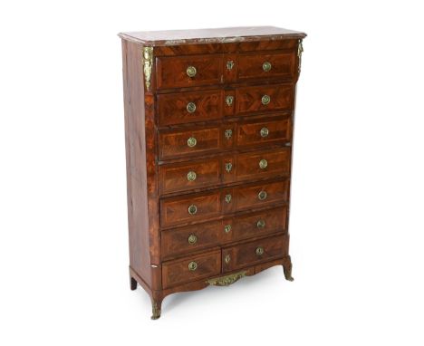 A Louis XVI style kingwood semanier with rouge marble top and seven long drawers, on cabriole legs, 103cm wide, 44cm deep, 16