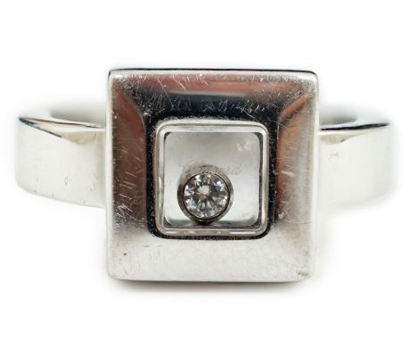 A modern Chopard 18ct white gold 'Happy Floating' diamond ring, makers mark GA, size K, gross weight 11.3 grams, with Chopard