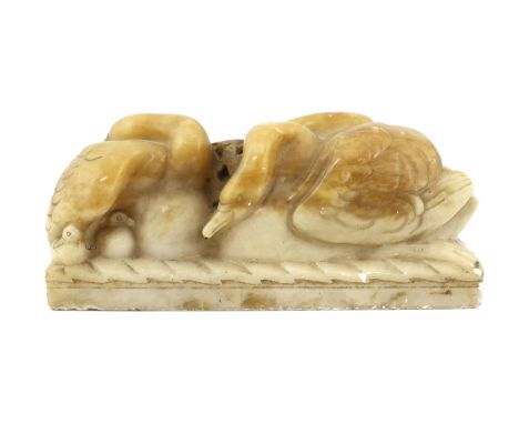 § § William McMillan A.R.A. (1887-1997), a carved alabaster group 'Swans', 43cm wide, 18cm high***CONDITION REPORT***Varying 