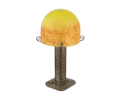 Mulaty, a Continental Arts &amp; Craft wrought iron and marbled glass table lamp, in the manner of Edgar Brandt, the domed mu