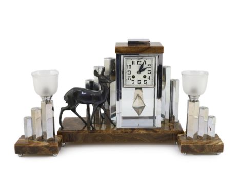 Attributed to Michel Decoux, a French Art Deco chrome and marble clock garniture, the central clock of four glass design with