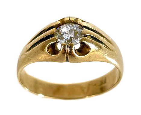 An 18ct gold solitaire diamond set gents ring.  The diamond measuring 0.33ct, size S 1/2, 5g.The diamond has a crack and seve