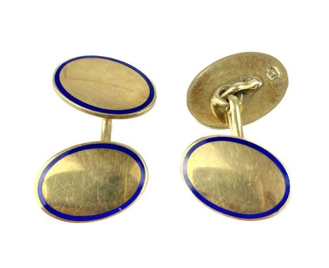 A pair of 14ct gold and blue enamel cuff links. The oval panels stamped 14c, 10g.