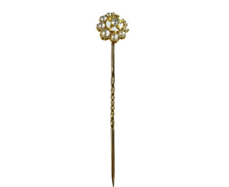 A high purity gold diamond and pearl set crescent and star stick pin. The diamond measures 0.05ct, the crescent with nine gra