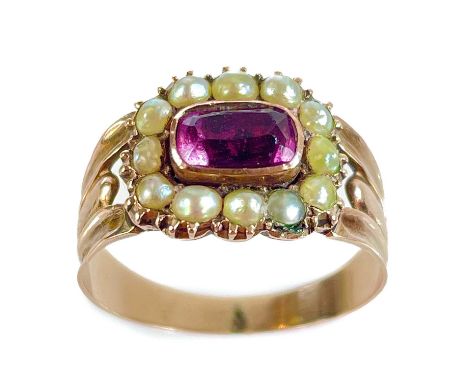A Georgian rose gold foiled amethyst and split pearl set ring. Size O, 2.46g.