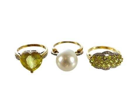 A contemporary 14ct diamond and gem set cluster ring. Together with a gem and diamond set ring and a cultured pearl and diamo