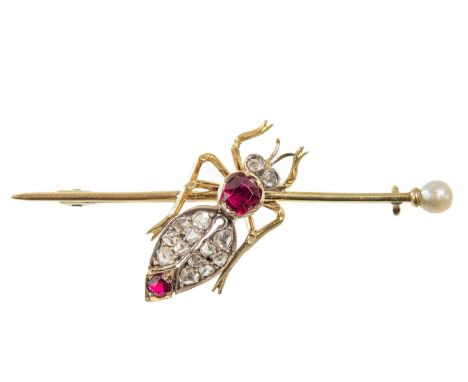 A wonderful Edwardian high purity gold diamond and ruby set Bee bar brooch.  The thorax set with a ruby measuring 0.25ct appr