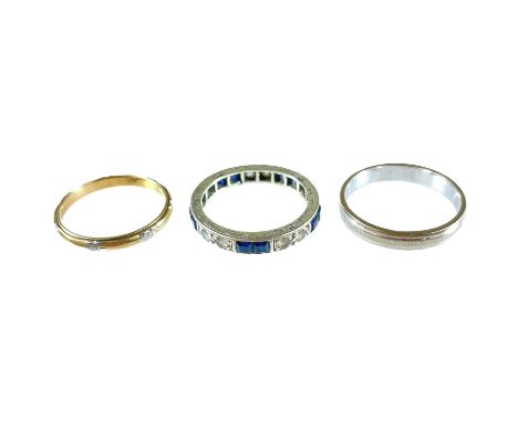 Three 9ct band rings. One set with white and blue sapphires, size K, 5.2g.
