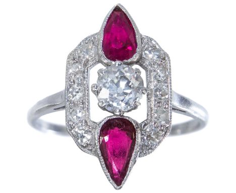 An attractive Art Deco 18ct platinum and diamond and ruby ring. The central claw set circular cut diamond measures 0.40ct app