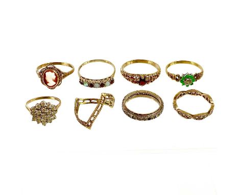 Eight various 9ct gold stone set rings. Including an emerald and diamond cluster ring, 20g.