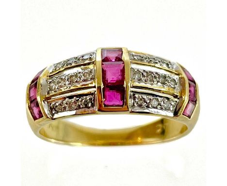 A modern 18ct diamond and ruby set band ring. Set with three bands of square cut rubies between three horizontal bands set wi