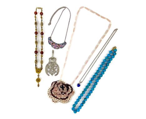 A collection of costume jewellery. Including a turquoise bead necklace with 9ct clasp, a rose quartz and pearl necklace, the 