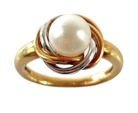 A modern 18ct rose and white gold cultured pearl set ring. Stamped 750 CB, size M, 4.68g.