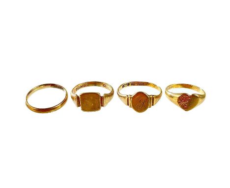 Four 9ct gold rings. Including three signet rings and a band ring, 8g.
