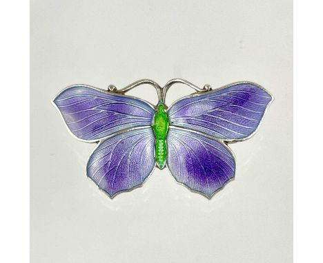 A sterling silver and enamel butterfly brooch by John Atkins &amp; Sons.  In purple and green enamel, stamped JA&amp;S STERLI