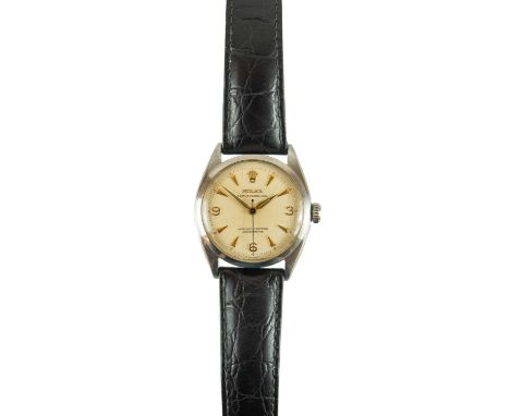 A Rolex Oyster Perpetual Officially Certified Chronometer stainless steel gentleman's wristwatch. Circa 1955, the silver hone