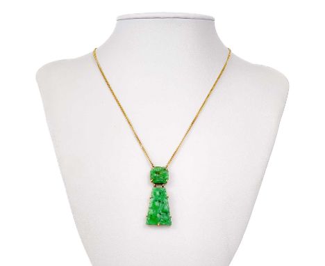 A modern 9ct gold Chinese green jade pendant necklace. Birmingham 1982, with two peach carved panels to the pendant, pendant 