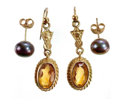 A pair of 9ct rose gold citrine set pendant earrings. Birmingham 1980, length of drop 28mm; together with a pair of black cul