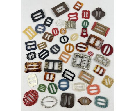 A collection of 50 vintage buckles in varying colours, sizes and designs. To include wood, diamante set and early plastic. 
