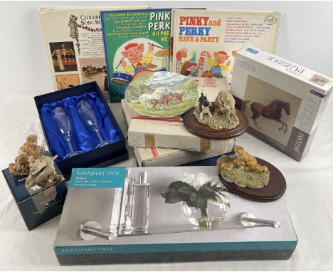 A box of mixed items to include resin animal figurines, collectors plates depicting rural scenes and horses, vintage children