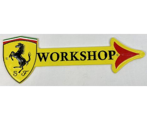 A wall mountable painted cast iron garage workshop arrow with Ferrari logo. Painted in yellow, black, red, green &amp; white 