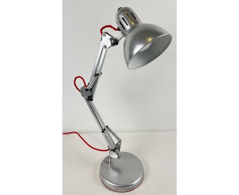A vintage chrome metal angle poise lamp with angled head. Replacement baize to base. Fully extended approx. 85cm tall. 
