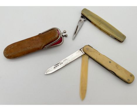 An antique silver blade manicure knife with leather carry purse. Together with a vintage penknife marked Sheffield stainless 