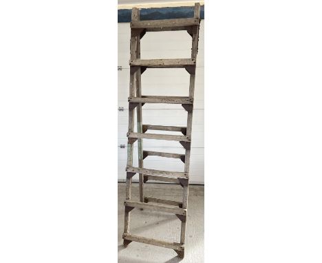A large vintage wood folding decorators trestle, ideal display item. Approx. 216cm tall x 59cm wide. 