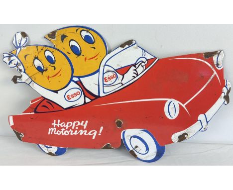 An enamel advertising wall sign of the Esso oil drop boy &amp; girl driving a car. Approx. 50cm long x 34cm tall. 