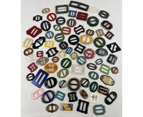 A collection of 75 vintage buckles, mostly early plastic. In varying colours, sizes and designs to include Art Deco. 