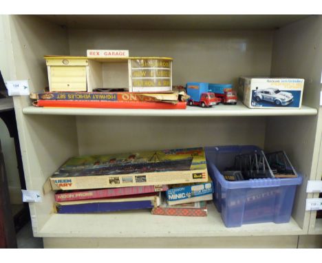 Miscellaneous toys: to include three Corgi diecast model Chipperfields Circus vehicles; and a vintage model motor showroom 