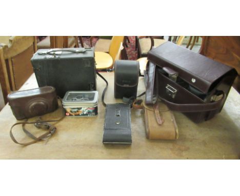 A collection of vintage and later cameras: to include a Minox Digital Clavic MC; a Chinon CA-4; and an unidentified large box