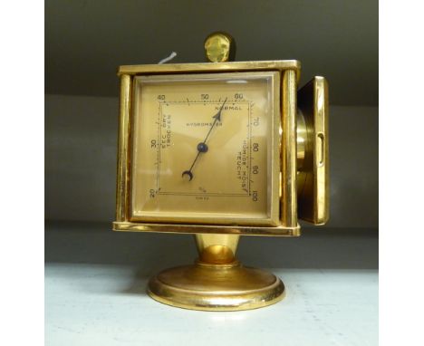 An Imhof lacquered brass combination timepiece of cube design, incorporating a thermometer, a barometer and a hydrometer, rot