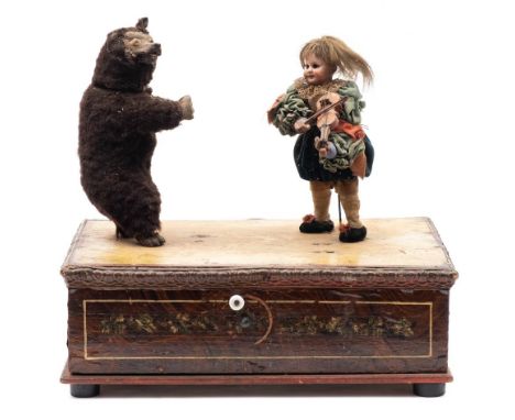 A late 19th Century French musical automaton: girl with dancing bear, the hand wound mechanism operating a bear with turning 