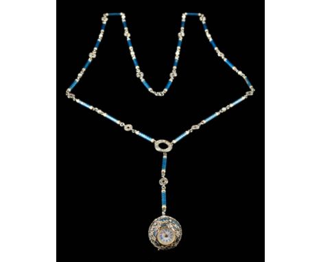 An early 20th century enamelled gold, platinum and diamond mounted spherical pendant watch: with circular white enamel dial 9