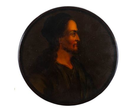 A 19th century papier mache snuff box: the circular lid decorated with a portrait of an Italian peasant, 9cm diameter. 