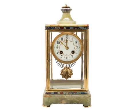An onyx and enamel French mantel clock: the eight-day duration movement striking the hours and half-hours on a gong, the crea