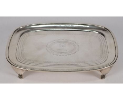 A George III silver teapot stand, maker Duncan Erquhart &amp; Naphtali Heart, London, 1804: crested, of rectangular outline w