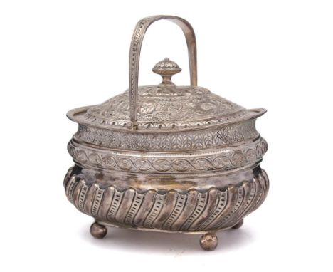 A George V silver swing handled sugar basket, maker Holland, Aldwinckle &amp; Slater, London, 1910: of barge shaped outline, 