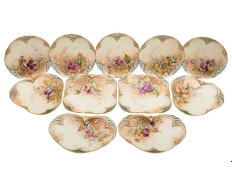 A Royal Worcester fruit painted porcelain dessert service: each piece of shaped and reticulated form, decorated in coloured e